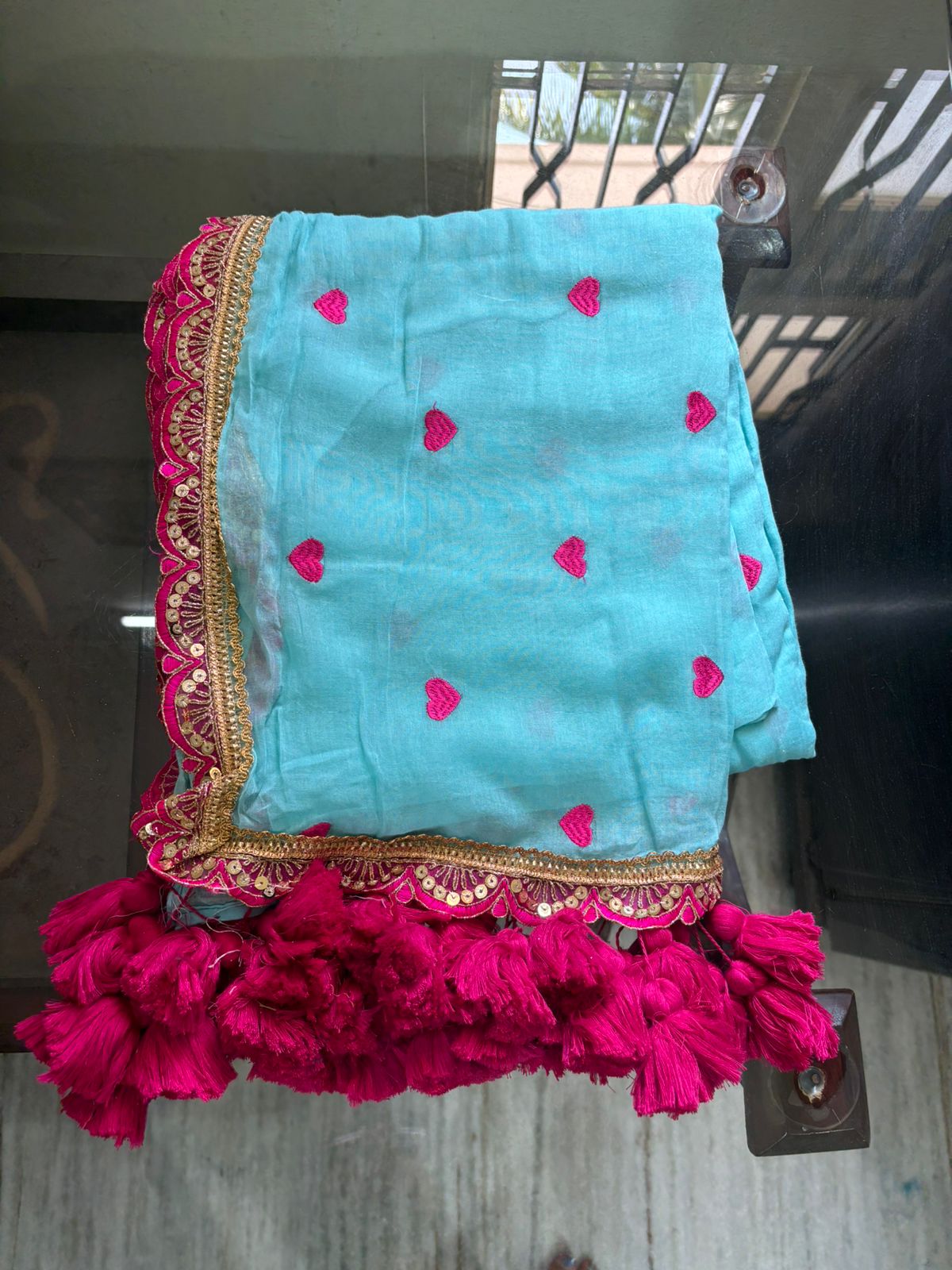 Sky blue with pink lace border