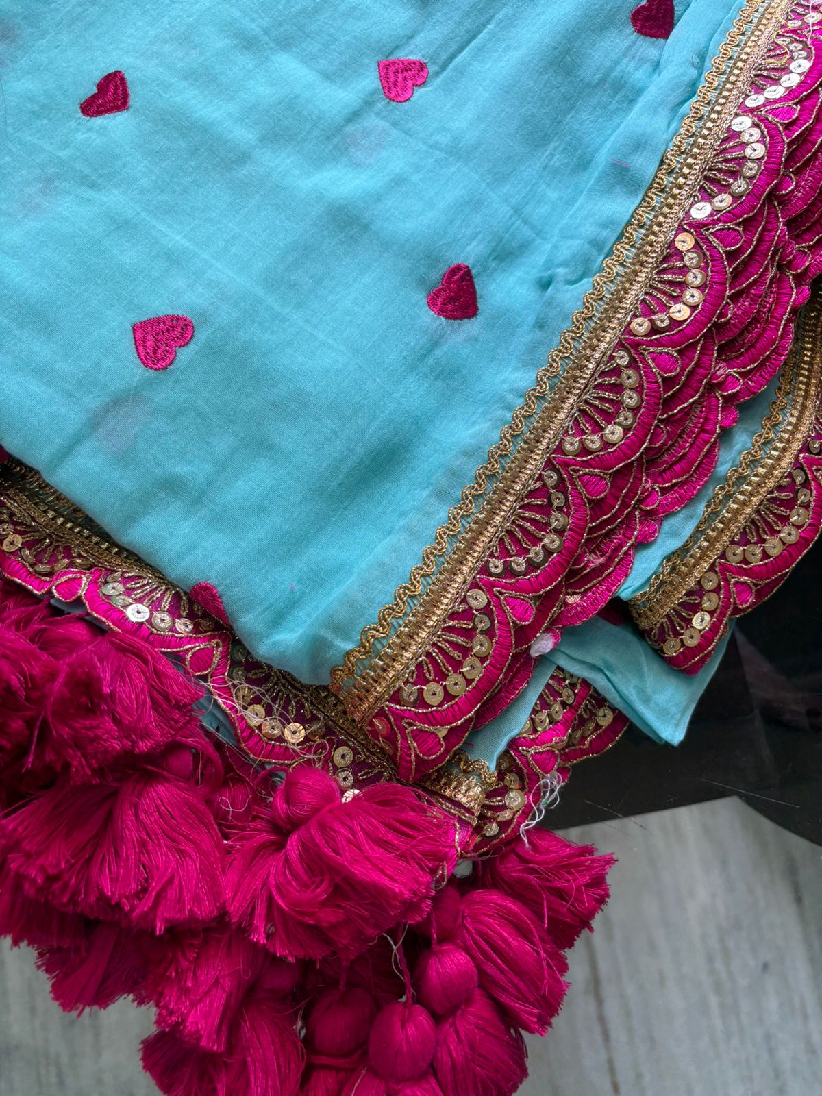 Sky blue with pink lace border