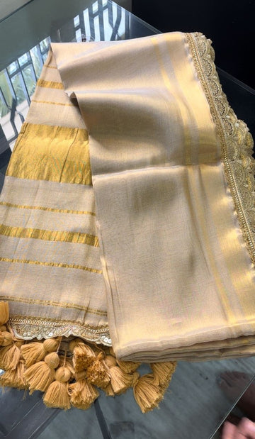 Light beige gold tissue saree