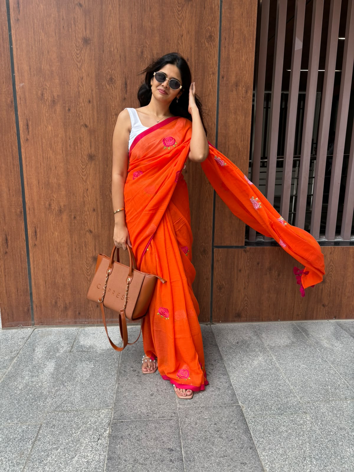 Orange with pink roses