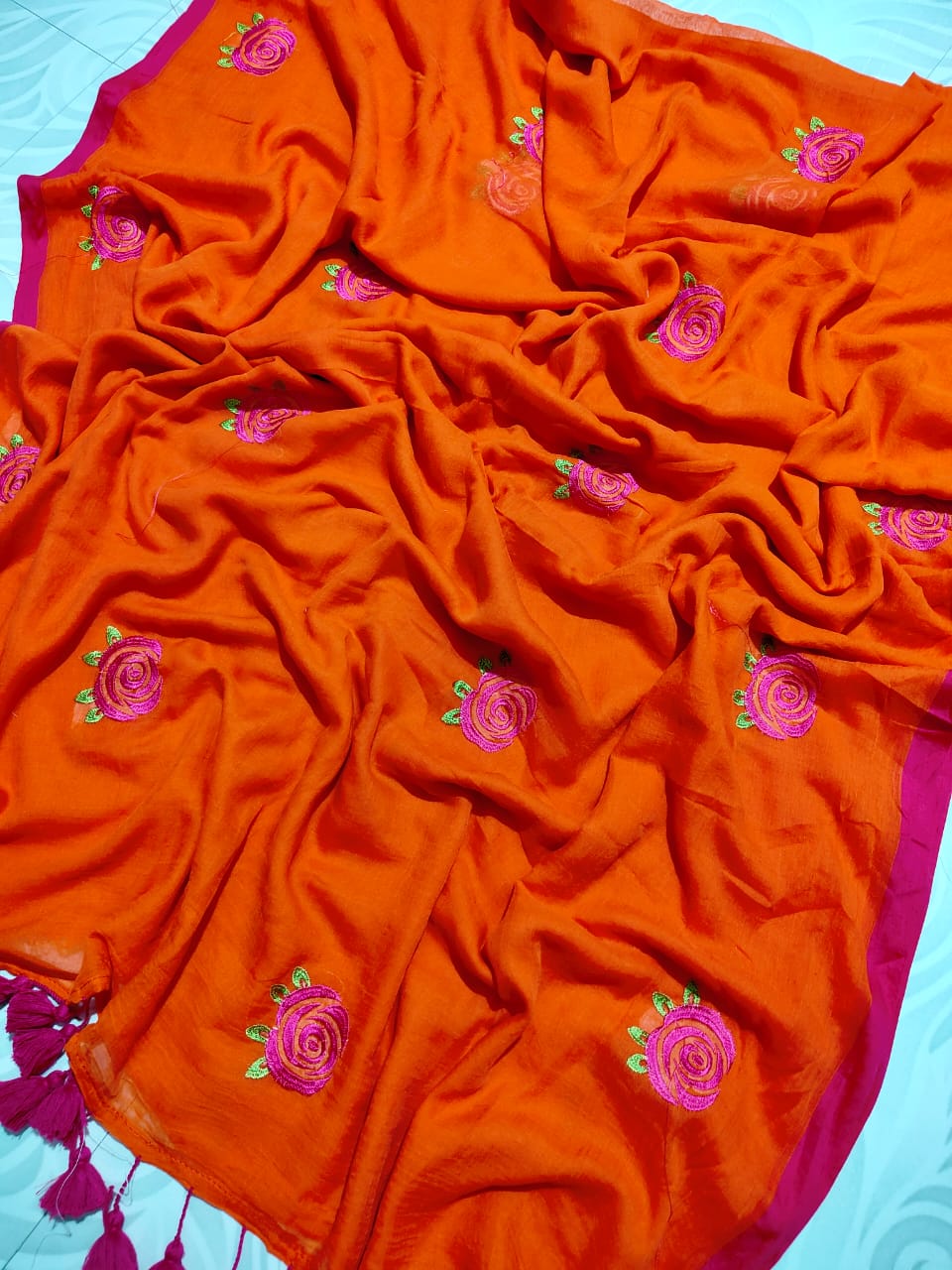 Orange with pink roses