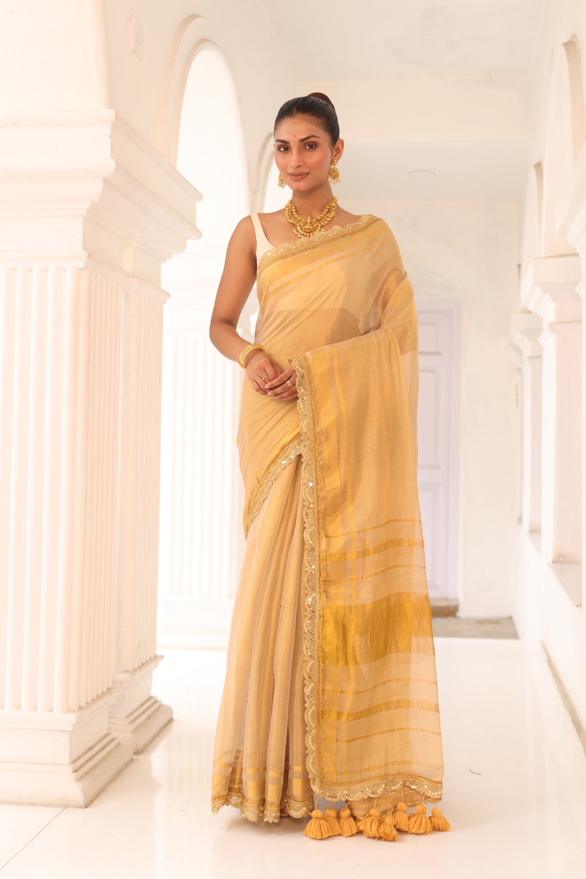 Light beige gold tissue saree