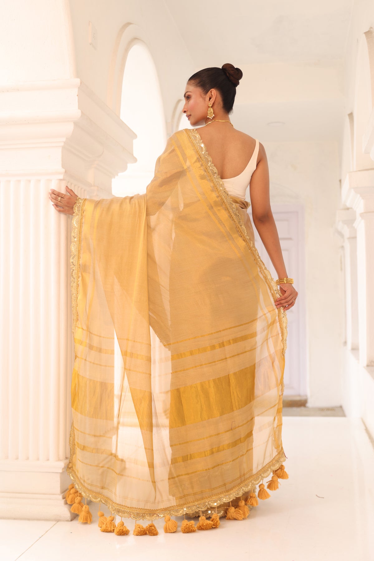 Light beige gold tissue saree