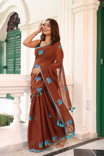 Brown with blue roses