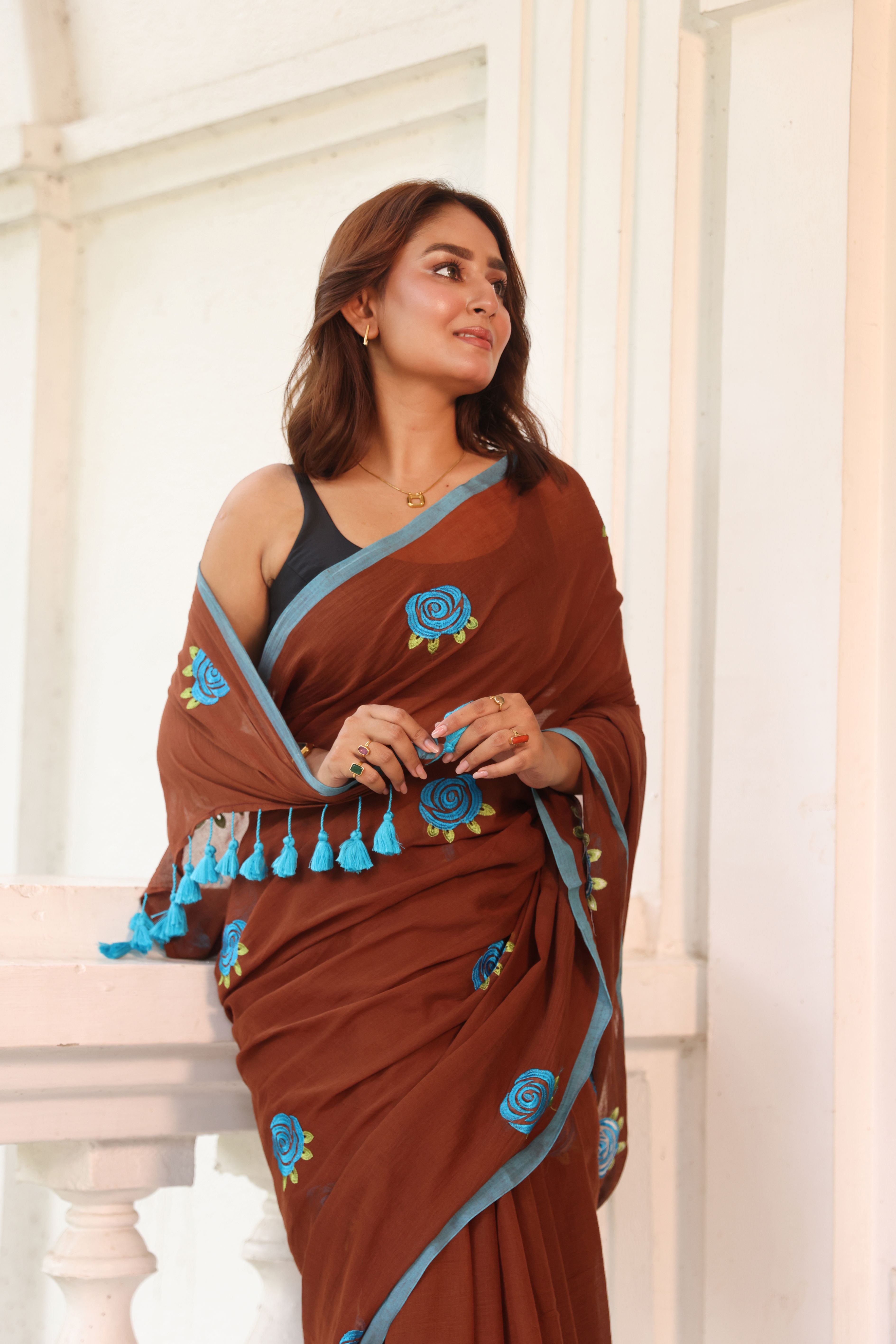 Brown with blue roses